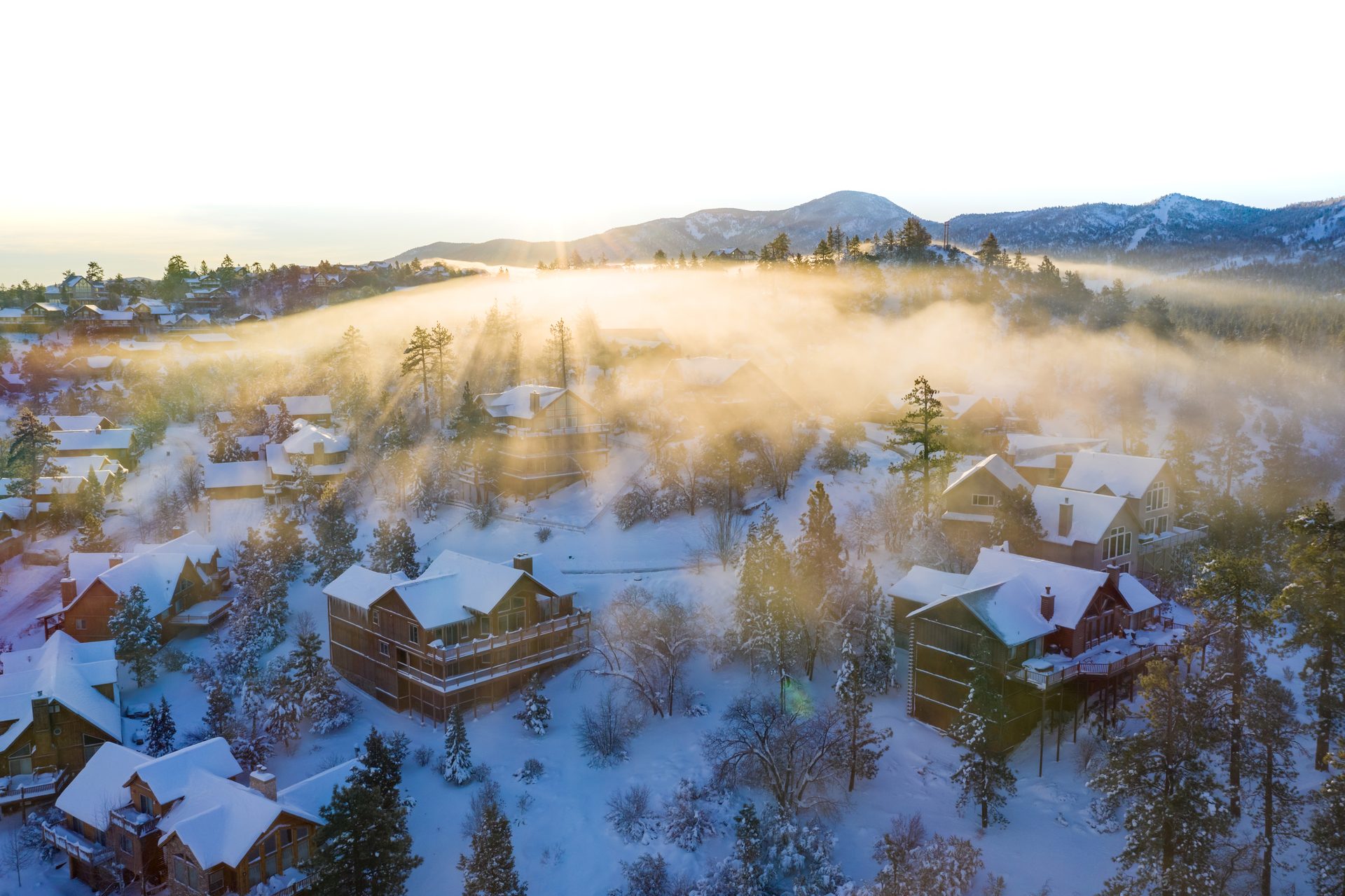 Snow-covered mountain homes in Big Bear